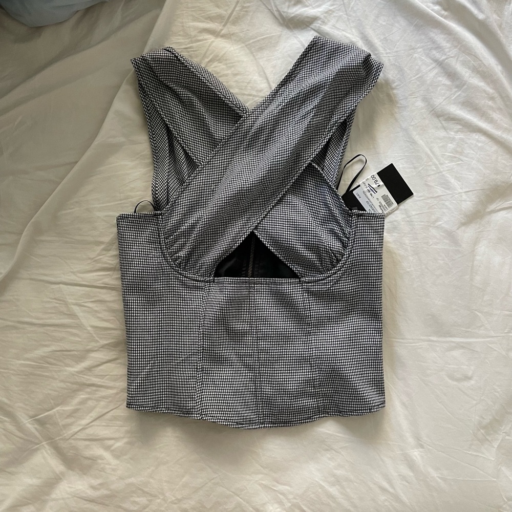 Lioness top size small